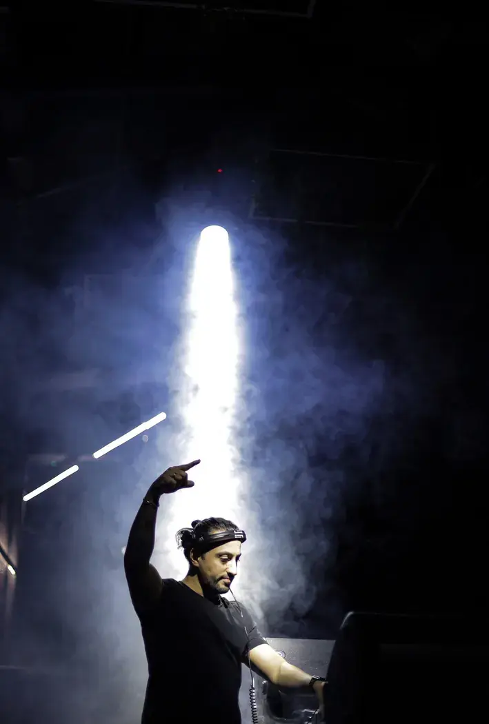 Performer under spotlight at a Beirut nightclub