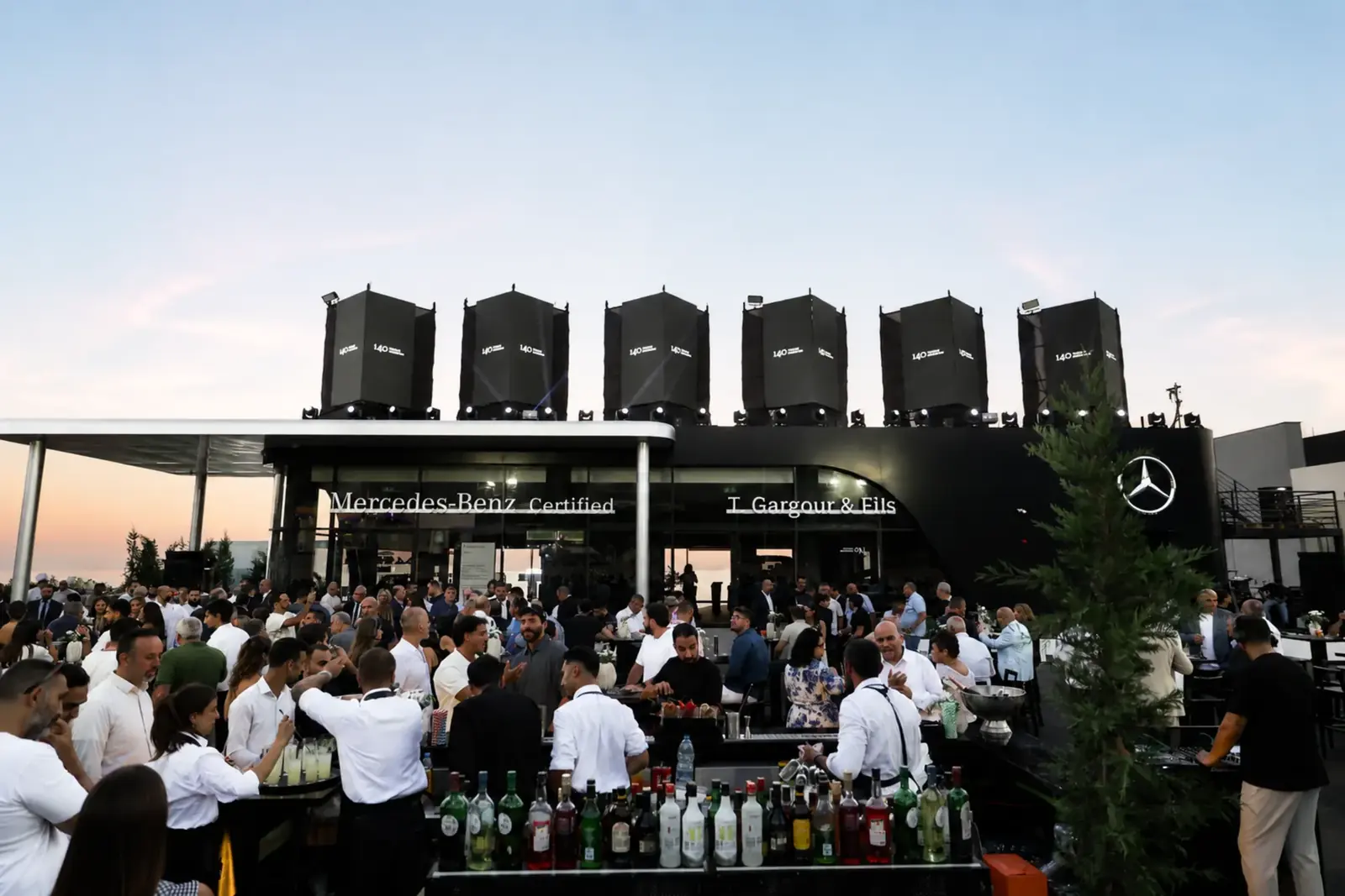Guests at sunset at the Mercedes-Benz Certified showroom opening in Thoum, Lebanon, produced by SevenPees