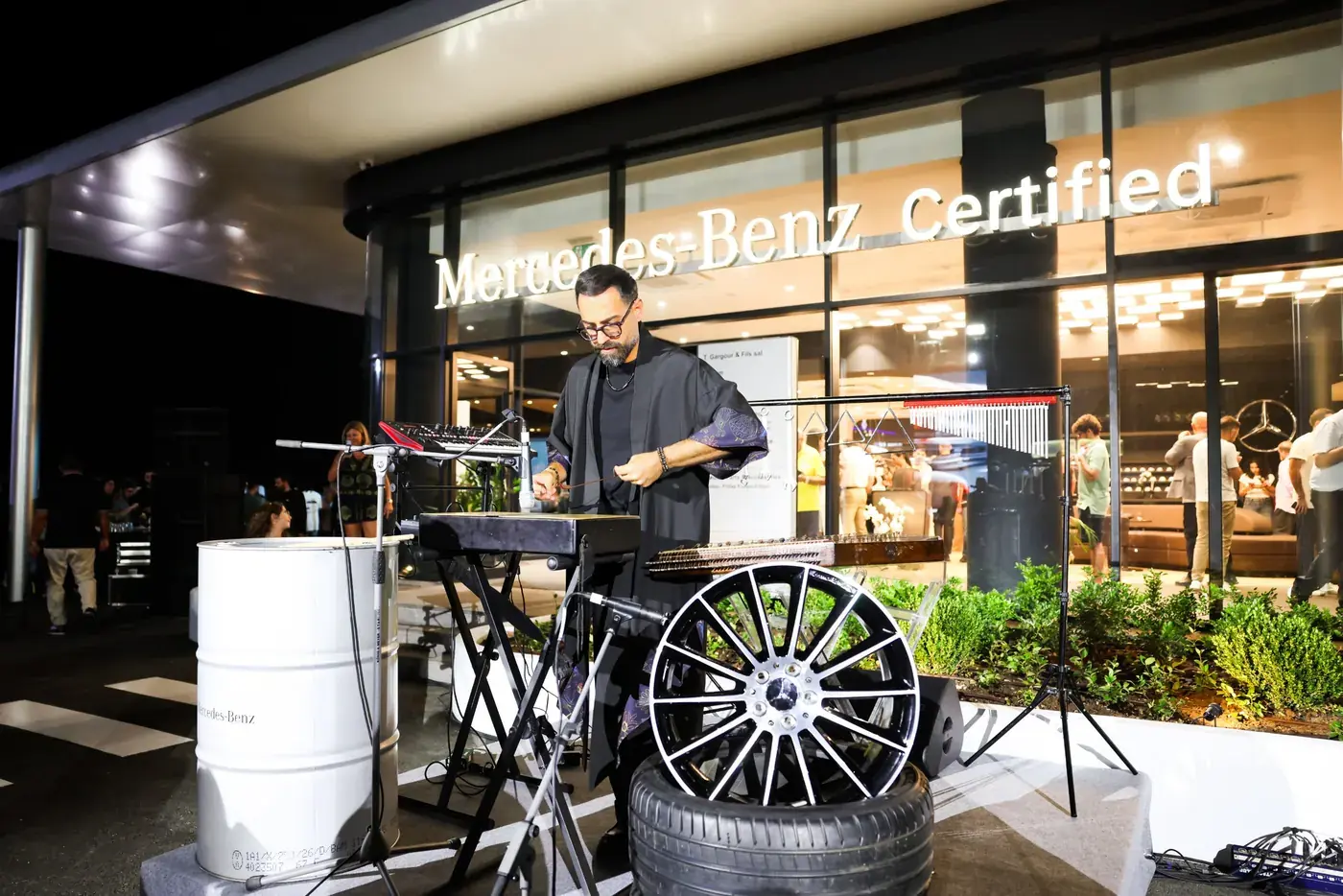 Performer with a Mercedes-Benz wheel installation