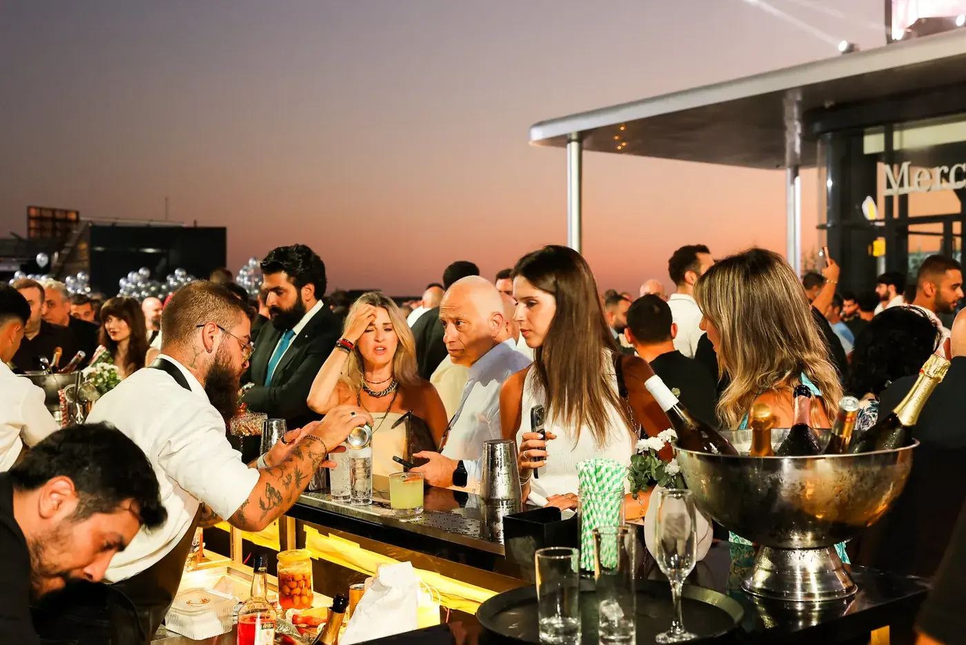 Outdoor bar service at sunset